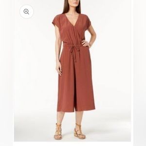 Eileen Fisher one piece romper. Size medium. Light stain at shown in picture.